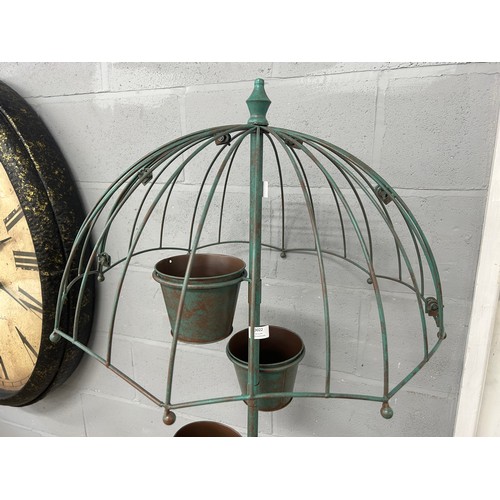3017B - A rustic green umbrella plant pot stand