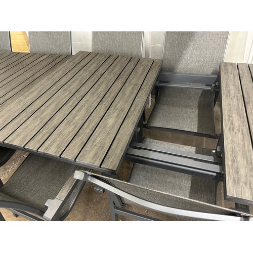 3018A - A Dark Forest 9 piece outdoor dining set, (4236-35) *This lot is subject to VAT