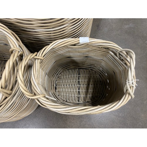 3020A - A set of three oval wicker baskets