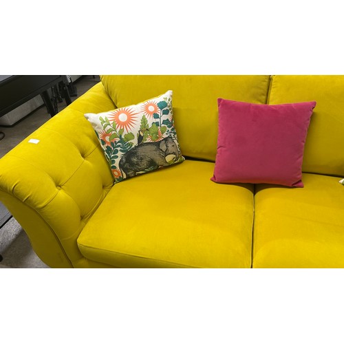 3017 - A lemon velvet upholstered 2 seater sofa