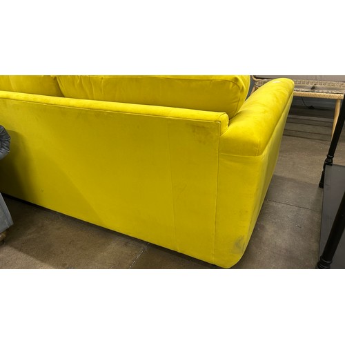 3017 - A lemon velvet upholstered 2 seater sofa