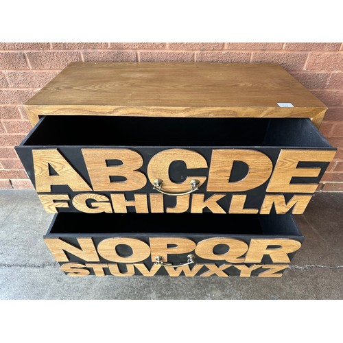 3028 - An alphabet 2 drawer chest