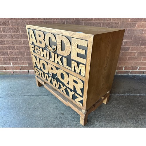 3028 - An alphabet 2 drawer chest