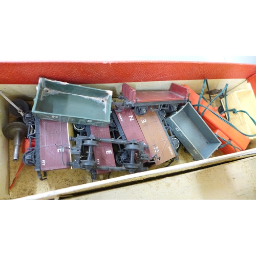 A collection of Tri-ang model railway, carriages, wagons and track, in ...