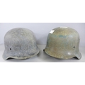 Two original German helmet shells