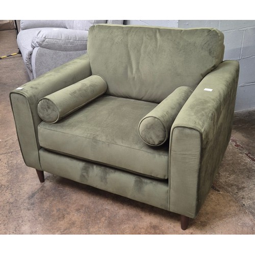 3118 - A moss green velvet upholstered oversized armchair