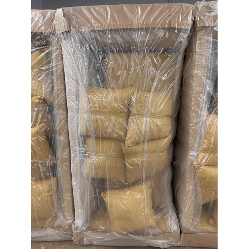 3121 - A mustard fabric upholstered three seater sofa, bagged