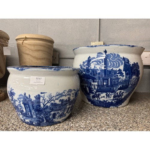 3145 - Two graduated white and blue ceramic planters