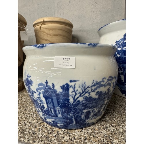 3145 - Two graduated white and blue ceramic planters