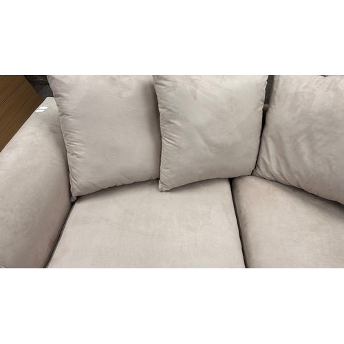 3152 - A champagne vegan suede upholstered three seater sofa