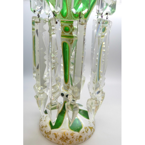 2012 - A 19th century Bohemian green and white glass lustre with gilt detail and clear glass droplets, 26cm... 