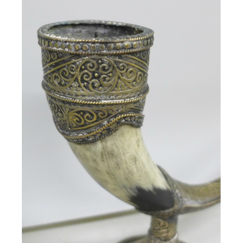 2014 - A Moroccan candle holder in the form of a pipe, 43cm