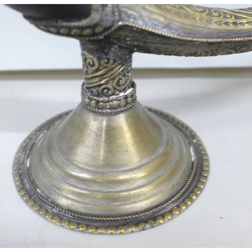 2014 - A Moroccan candle holder in the form of a pipe, 43cm