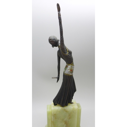2028 - A small bronze Art Deco style figure on an onyx base, in the manner of Demetre Chiparus, (Romanian 1... 