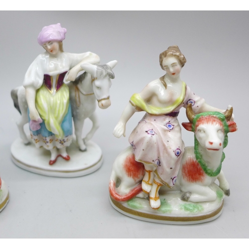 2030 - A collection of four miniature porcelain figures with Sitzendorf mark, (3 a/f)