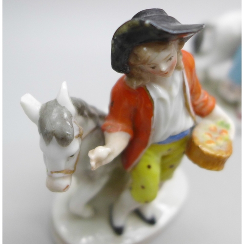 2030 - A collection of four miniature porcelain figures with Sitzendorf mark, (3 a/f)