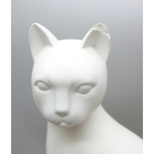 2035 - A plaster sculpture of a cat, after Elegance by Heinz Warneke, ear a/f, and another model of an Egyp... 