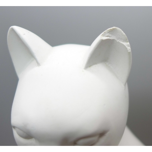 2035 - A plaster sculpture of a cat, after Elegance by Heinz Warneke, ear a/f, and another model of an Egyp... 