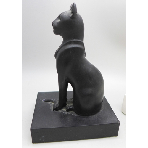 2035 - A plaster sculpture of a cat, after Elegance by Heinz Warneke, ear a/f, and another model of an Egyp... 