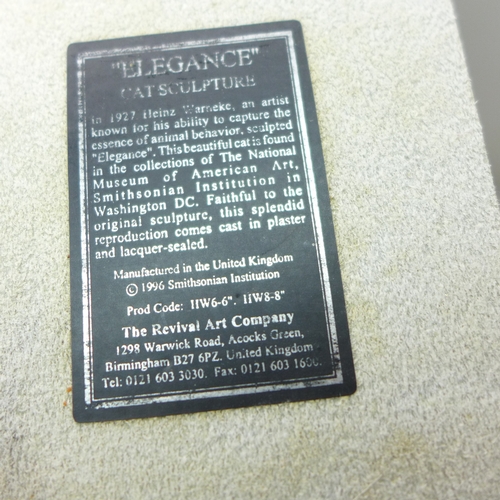 2035 - A plaster sculpture of a cat, after Elegance by Heinz Warneke, ear a/f, and another model of an Egyp... 
