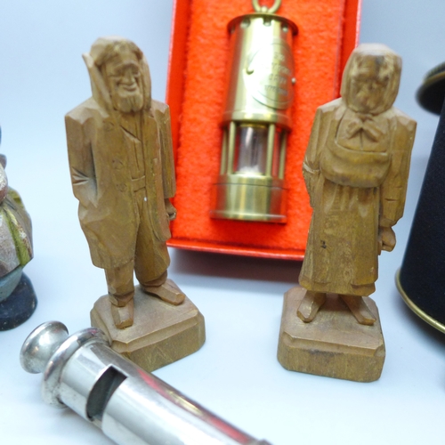 2036 - A small miners lamp marked ‘Sir Humphry Davy 1778-1829’, three carved wooden figures, embroidered ca... 