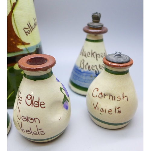 2038 - Four Devon Violets pottery scent bottles, one marked Cornish Violets, one marked Blackpool Breezes a... 