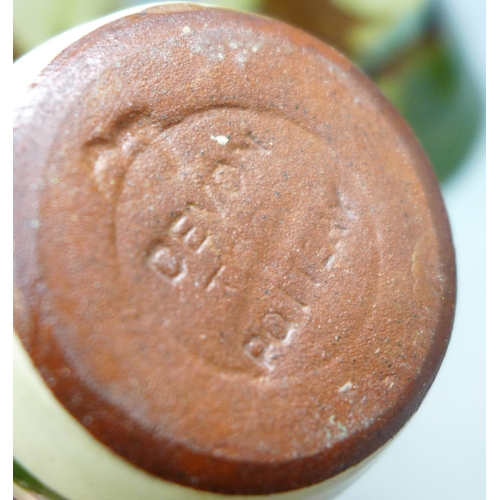 2038 - Four Devon Violets pottery scent bottles, one marked Cornish Violets, one marked Blackpool Breezes a... 