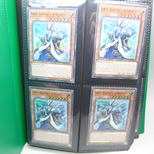 2040 - A folder of Yu-Gi-Oh cards including over 80 Holographic and 1st editions, 160 cards in total