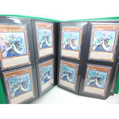 2040 - A folder of Yu-Gi-Oh cards including over 80 Holographic and 1st editions, 160 cards in total