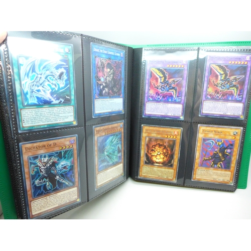 2040 - A folder of Yu-Gi-Oh cards including over 80 Holographic and 1st editions, 160 cards in total