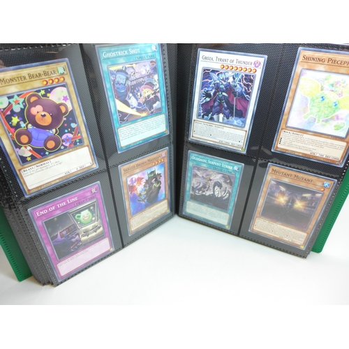 2040 - A folder of Yu-Gi-Oh cards including over 80 Holographic and 1st editions, 160 cards in total