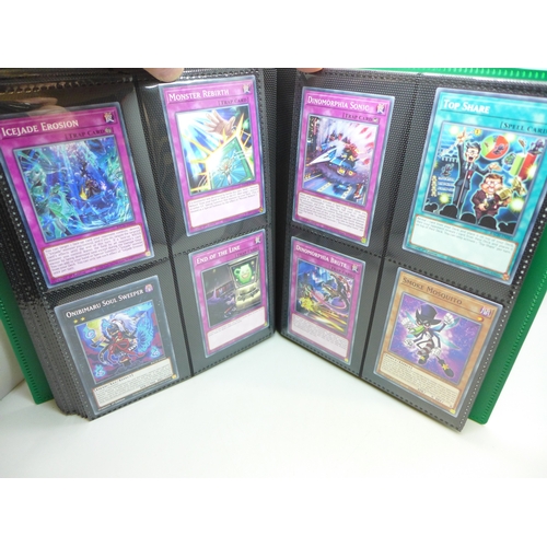2040 - A folder of Yu-Gi-Oh cards including over 80 Holographic and 1st editions, 160 cards in total
