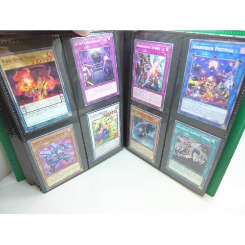2040 - A folder of Yu-Gi-Oh cards including over 80 Holographic and 1st editions, 160 cards in total