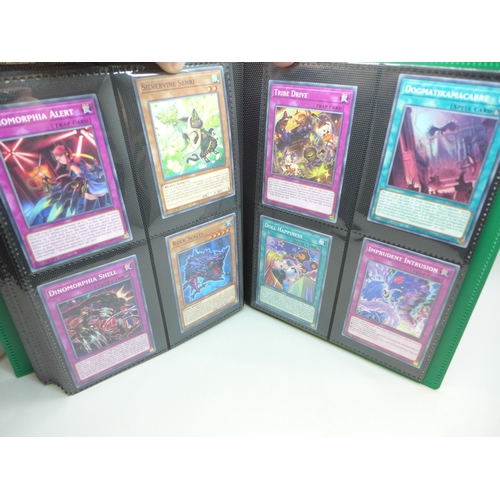 2040 - A folder of Yu-Gi-Oh cards including over 80 Holographic and 1st editions, 160 cards in total