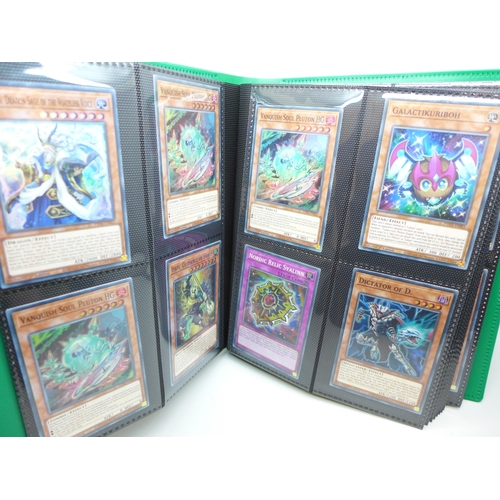 2040 - A folder of Yu-Gi-Oh cards including over 80 Holographic and 1st editions, 160 cards in total