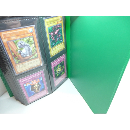 2040 - A folder of Yu-Gi-Oh cards including over 80 Holographic and 1st editions, 160 cards in total