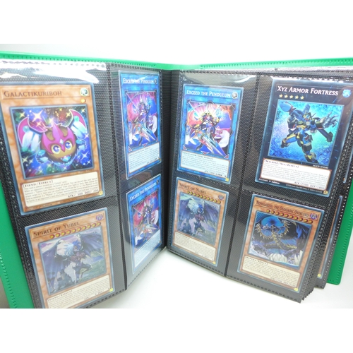 2040 - A folder of Yu-Gi-Oh cards including over 80 Holographic and 1st editions, 160 cards in total