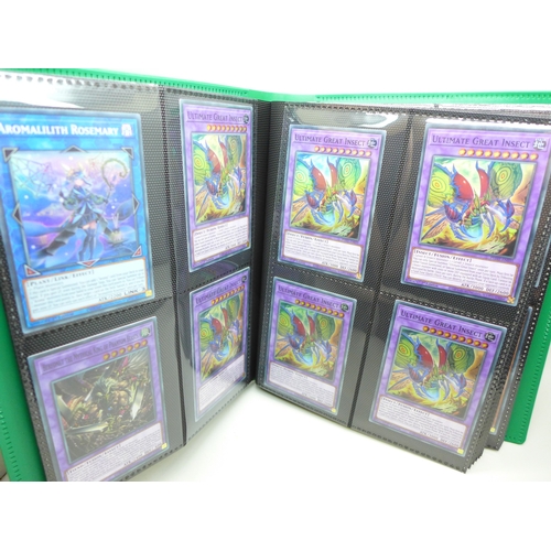 2040 - A folder of Yu-Gi-Oh cards including over 80 Holographic and 1st editions, 160 cards in total