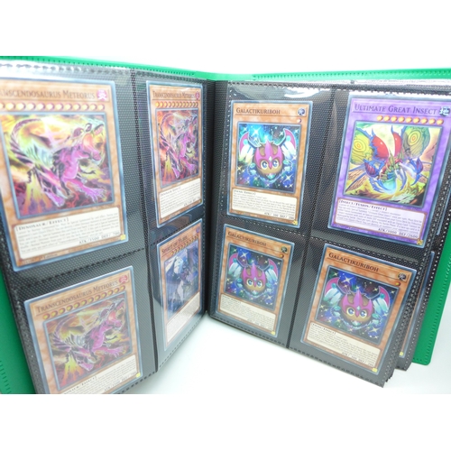 2040 - A folder of Yu-Gi-Oh cards including over 80 Holographic and 1st editions, 160 cards in total