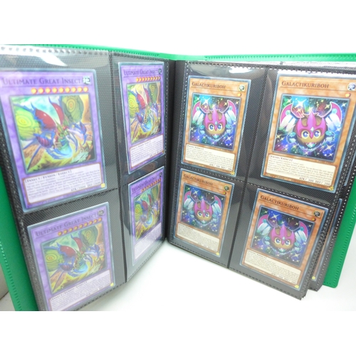 2040 - A folder of Yu-Gi-Oh cards including over 80 Holographic and 1st editions, 160 cards in total