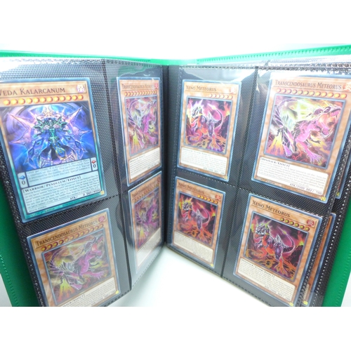 2040 - A folder of Yu-Gi-Oh cards including over 80 Holographic and 1st editions, 160 cards in total