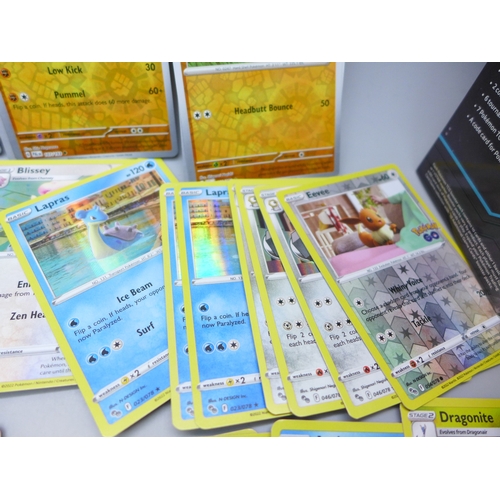 2041 - A collection of 330 Holographic Pokémon cards including Rares and Reverse Holos