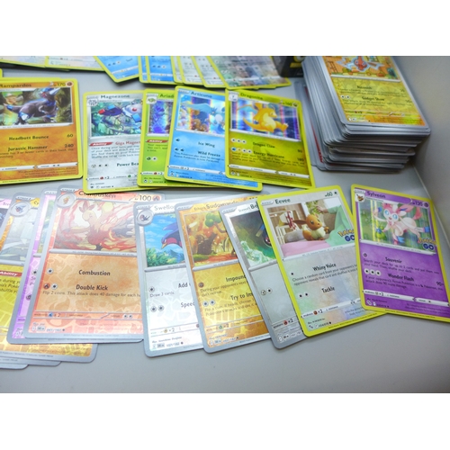 2041 - A collection of 330 Holographic Pokémon cards including Rares and Reverse Holos