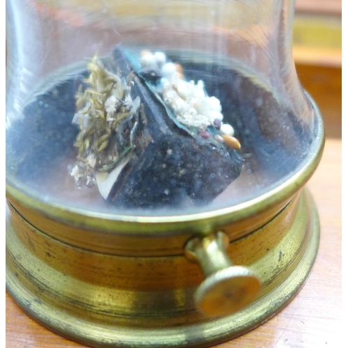 2044 - A Stanley rolling rule, boxed, two other boxes with wooden rulers, a cased set of balance scales wit... 