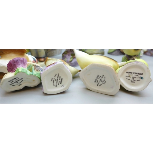 2045 - A collection of twelve Royal Worcester bird figures, a Hummel figure and a Corona Ware vase