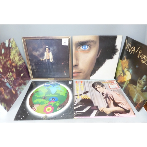 2057 - A collection of fourteen vinyl LP records including Ian Dury, Dylan, Georgie Fame, Roxy Music, etc.