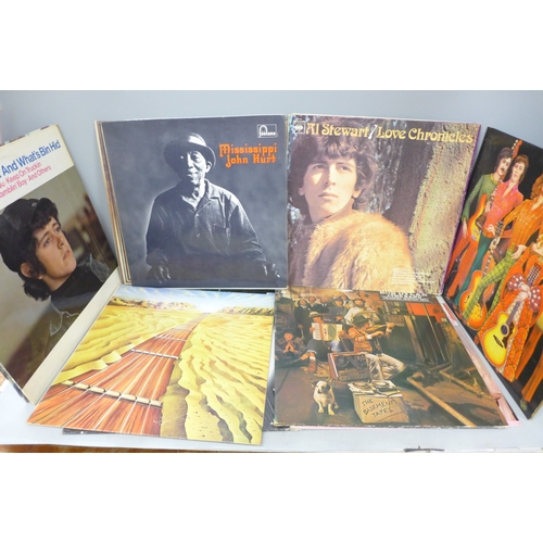 2057 - A collection of fourteen vinyl LP records including Ian Dury, Dylan, Georgie Fame, Roxy Music, etc.