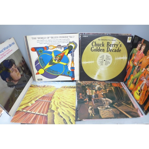 2057 - A collection of fourteen vinyl LP records including Ian Dury, Dylan, Georgie Fame, Roxy Music, etc.