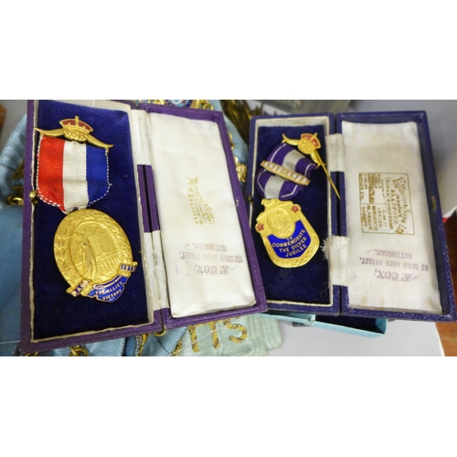 2058 - A collection of Royal Antediluvian Order of Buffaloes (RAOB) items to include sash, medals, arm cuff... 