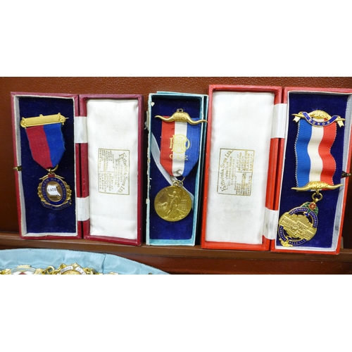 2058 - A collection of Royal Antediluvian Order of Buffaloes (RAOB) items to include sash, medals, arm cuff... 